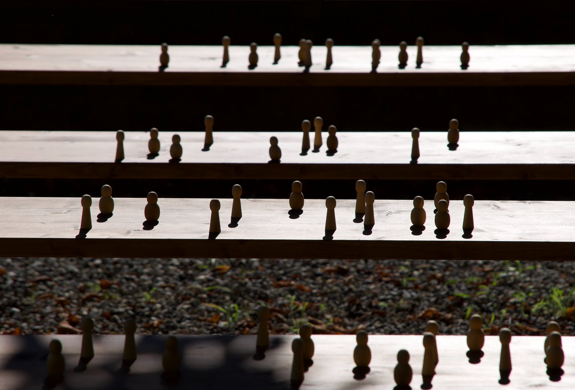 8D team formation _set of wooden figurines on steps